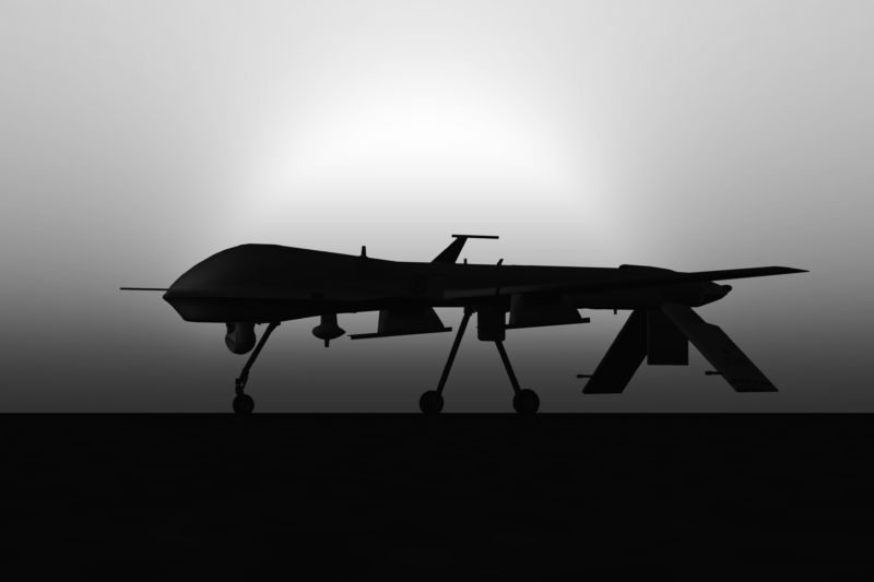 General Atomics MQ-1 Predator drone ready to take off at sunset.